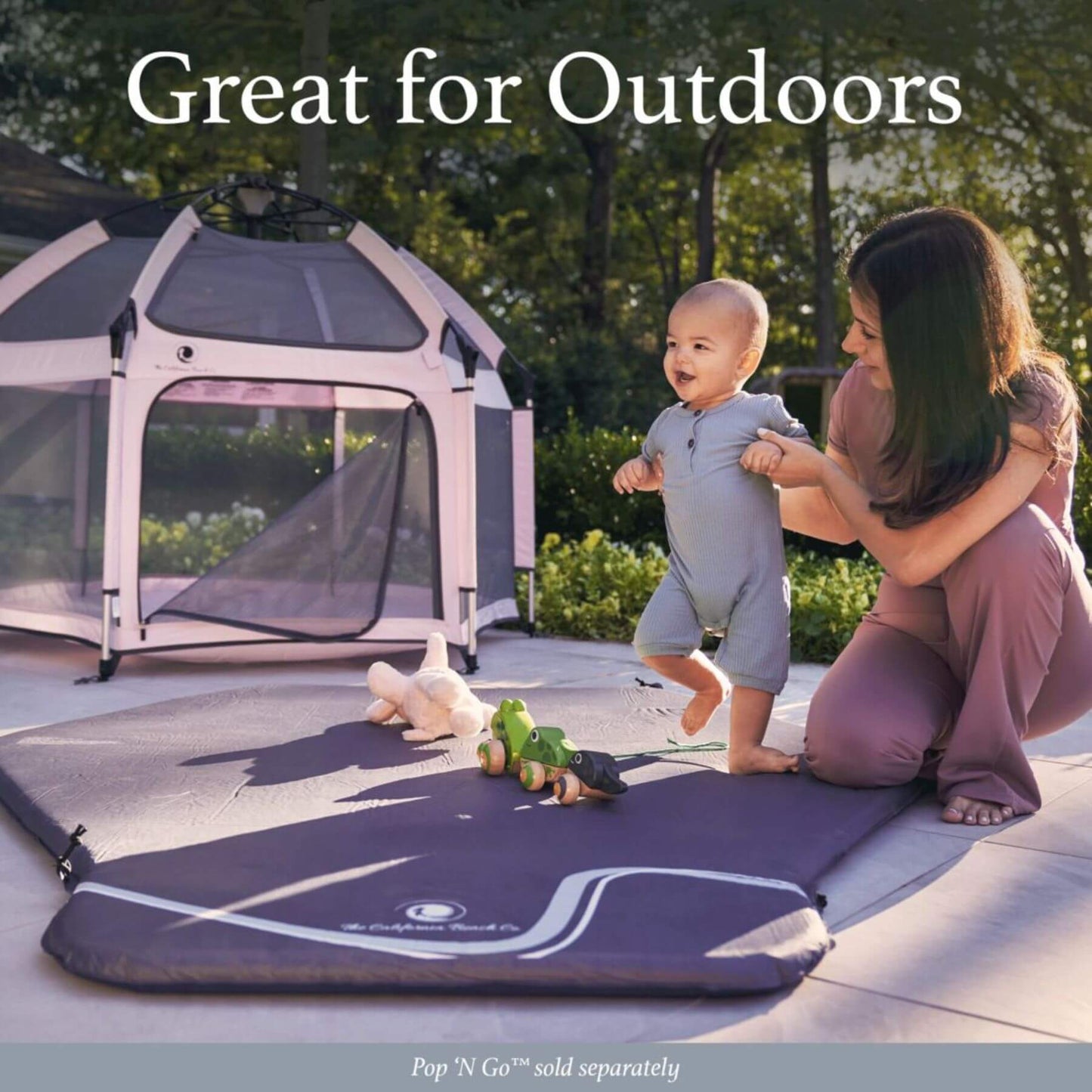 Mom Supporting Baby Walking on The California Beach Co. Pop 'N Go™ Play Mat 2.0