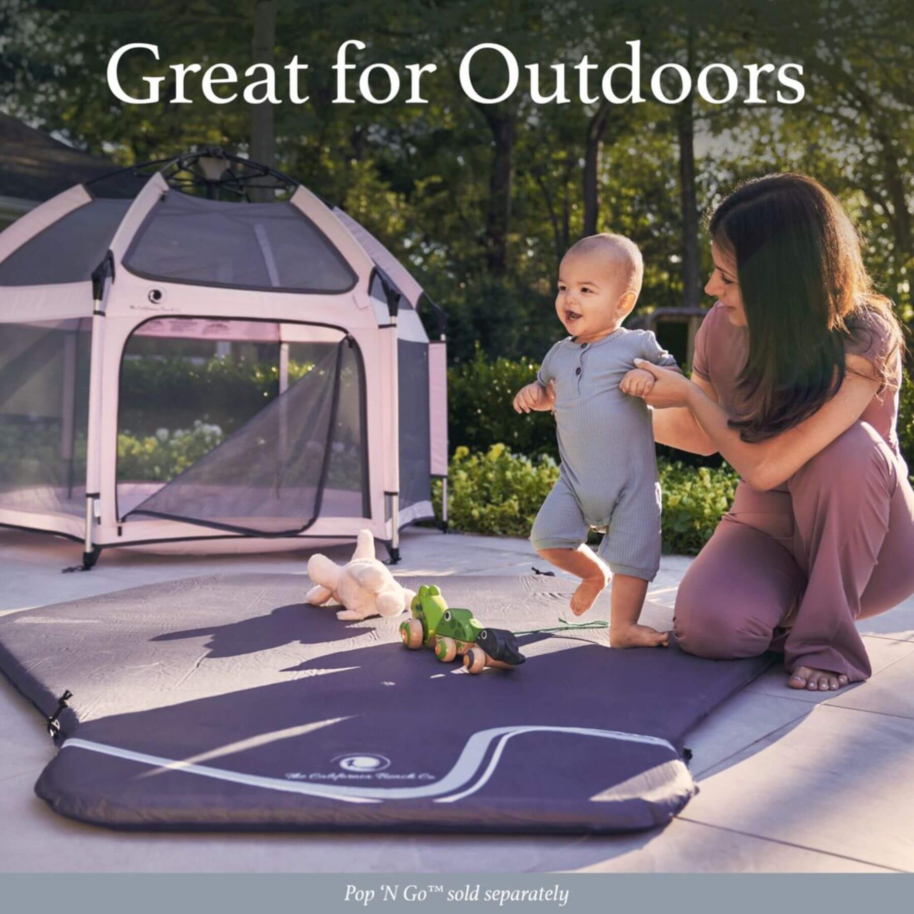 Mom Supporting Baby Walking on The California Beach Co. Pop 'N Go™ Play Mat 2.0