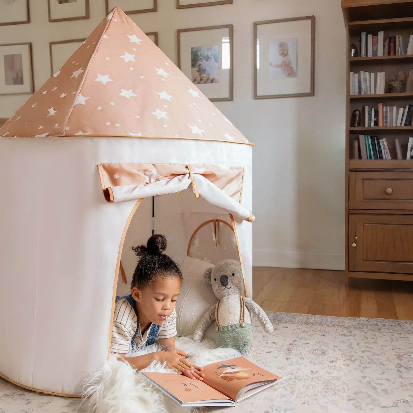 Girl Reading inside Tiny Land® Compact Adventure 3-in-1 Play Tunnel