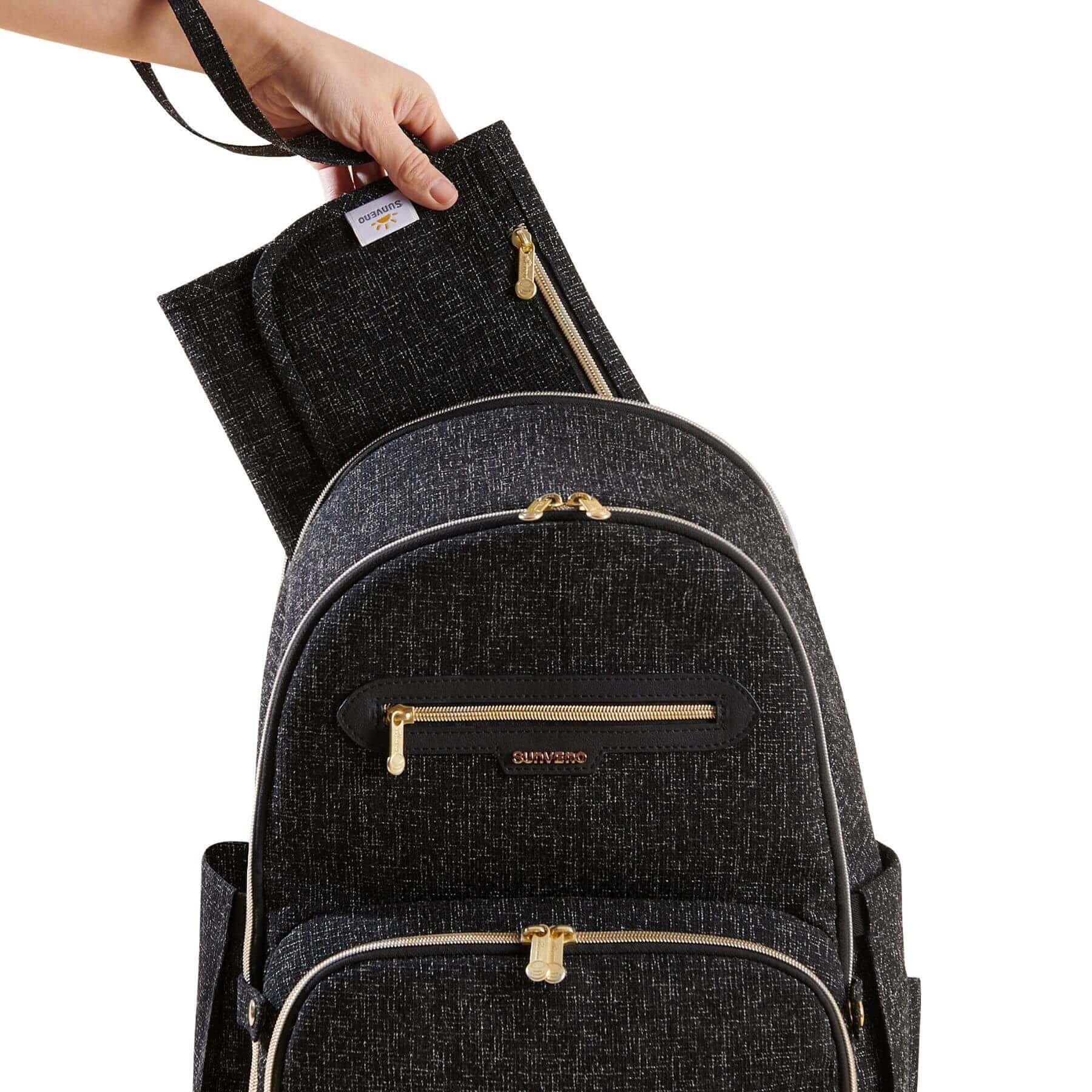 Sunveno Convertible Tweed Diaper Backpack Black held by a hand
