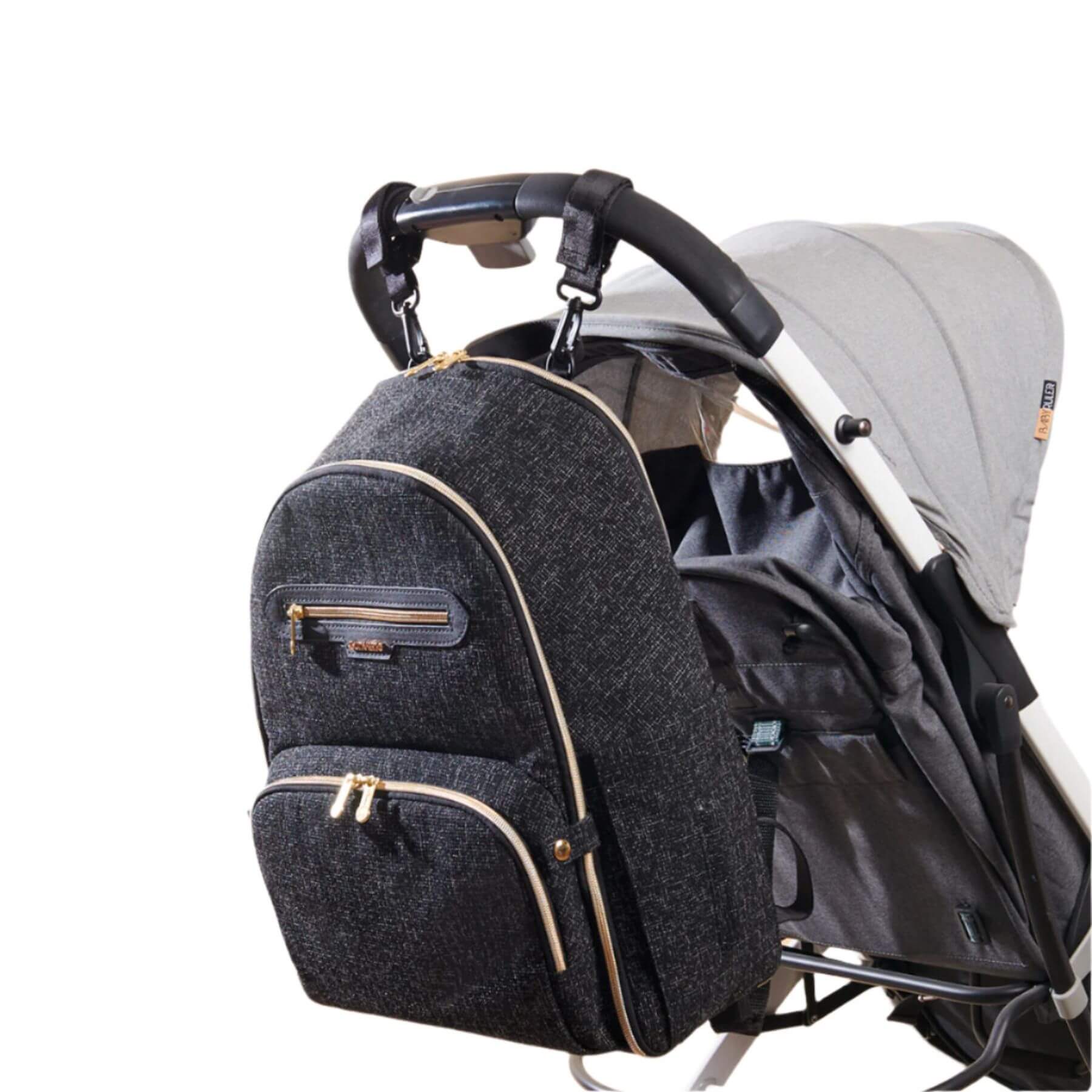 Sunveno Convertible Tweed Diaper Backpack Black attached to a stroller