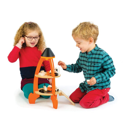 Two children playing with Tender Leaf Cosmic Rocket Set