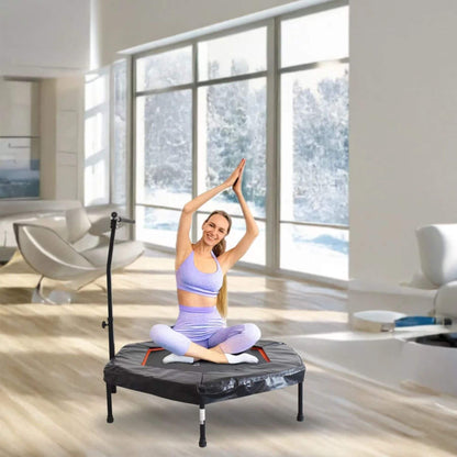 Woman exercising on Crowntec 50'' UV-Resistant Hexagonal Trampoline with Handlebar