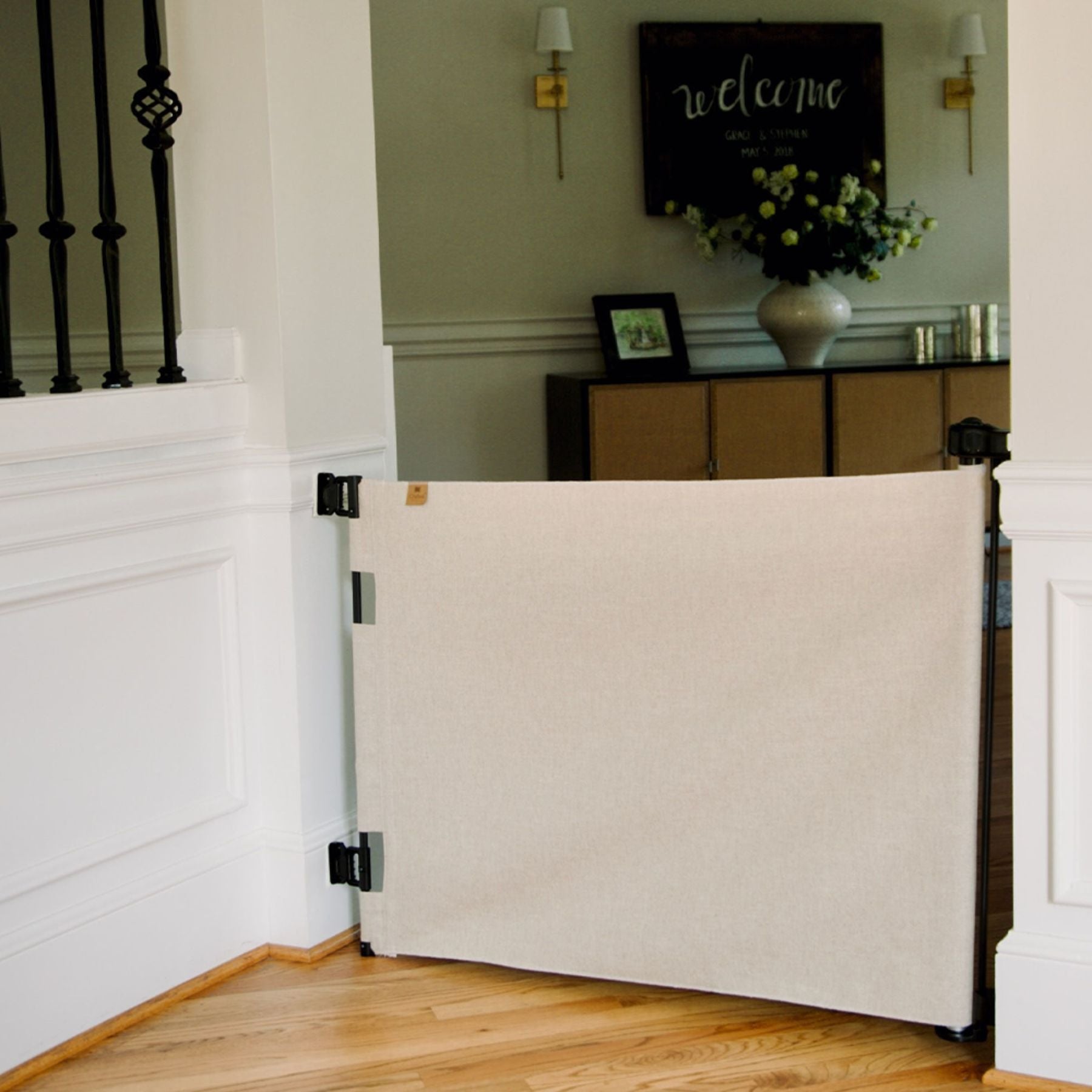 Crypton® Fabric Baby & Pet Safety Gate - Dove in a home setting with decor elements.