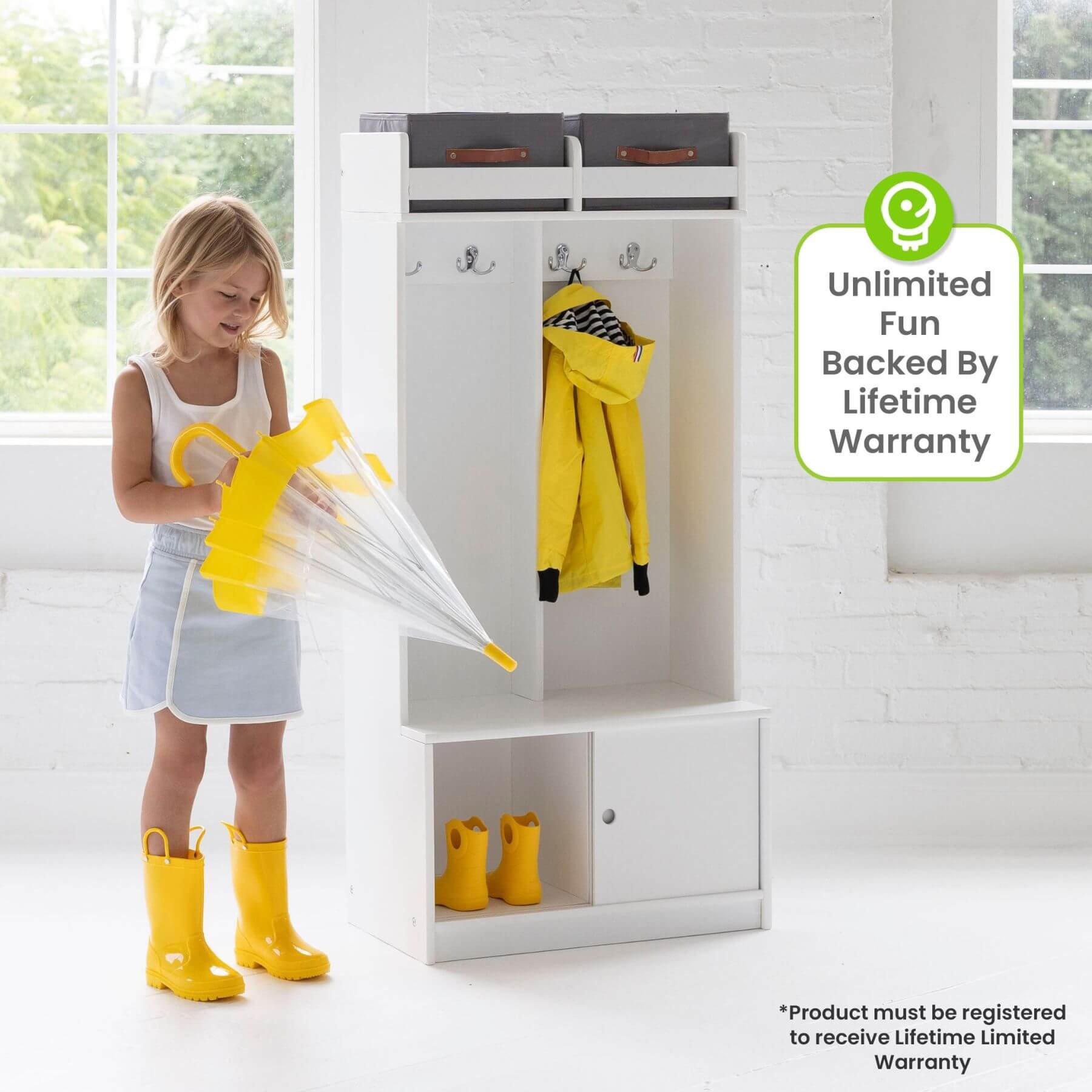 Girl Folding Umbrella next to Little Partners Deluxe Cubby White