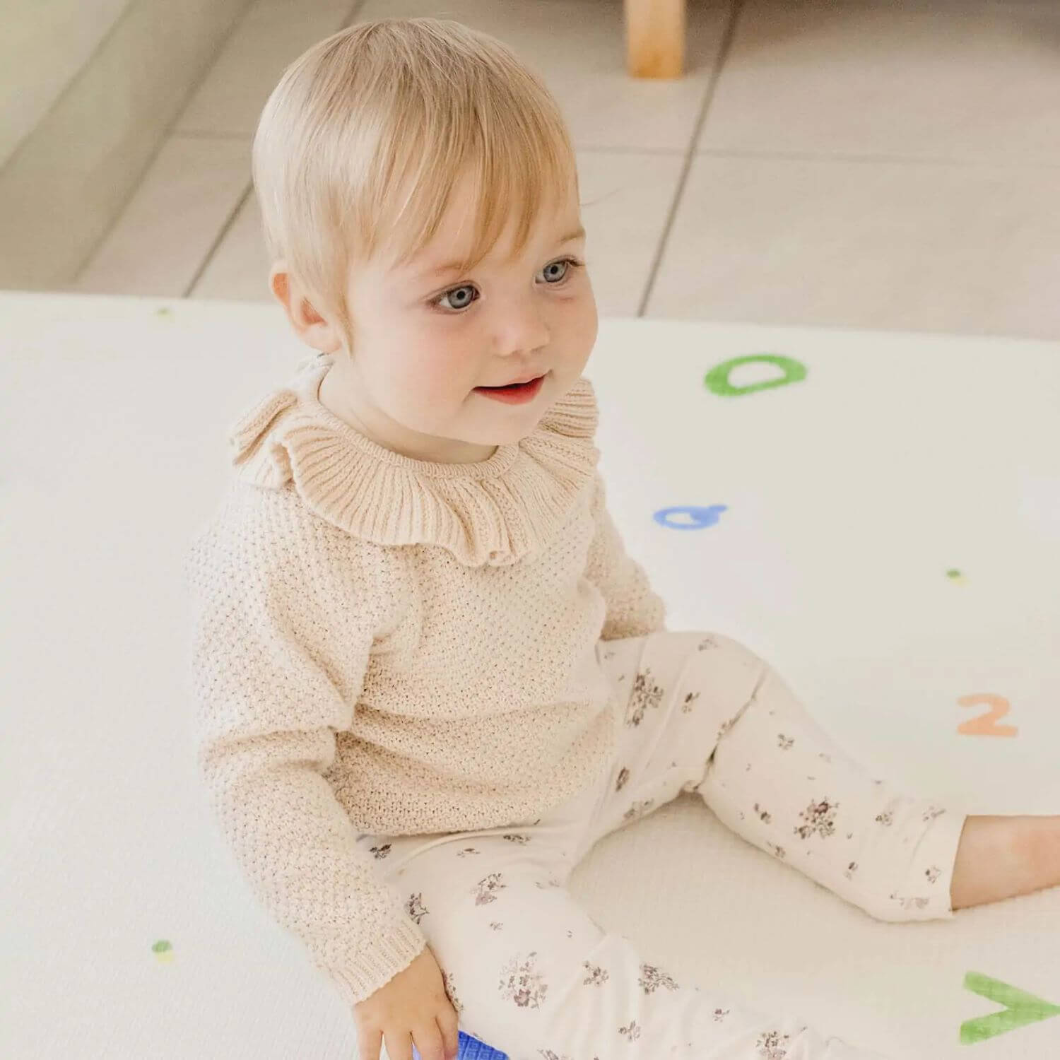 Baby Sitting on Double-Sided Baby Playmat Alphabet Adventure