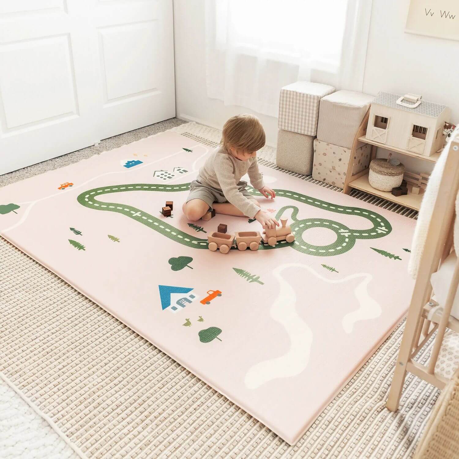 Boy Playing on Tiny Land® Double-Sided Baby Playmat Forest Track Wonder