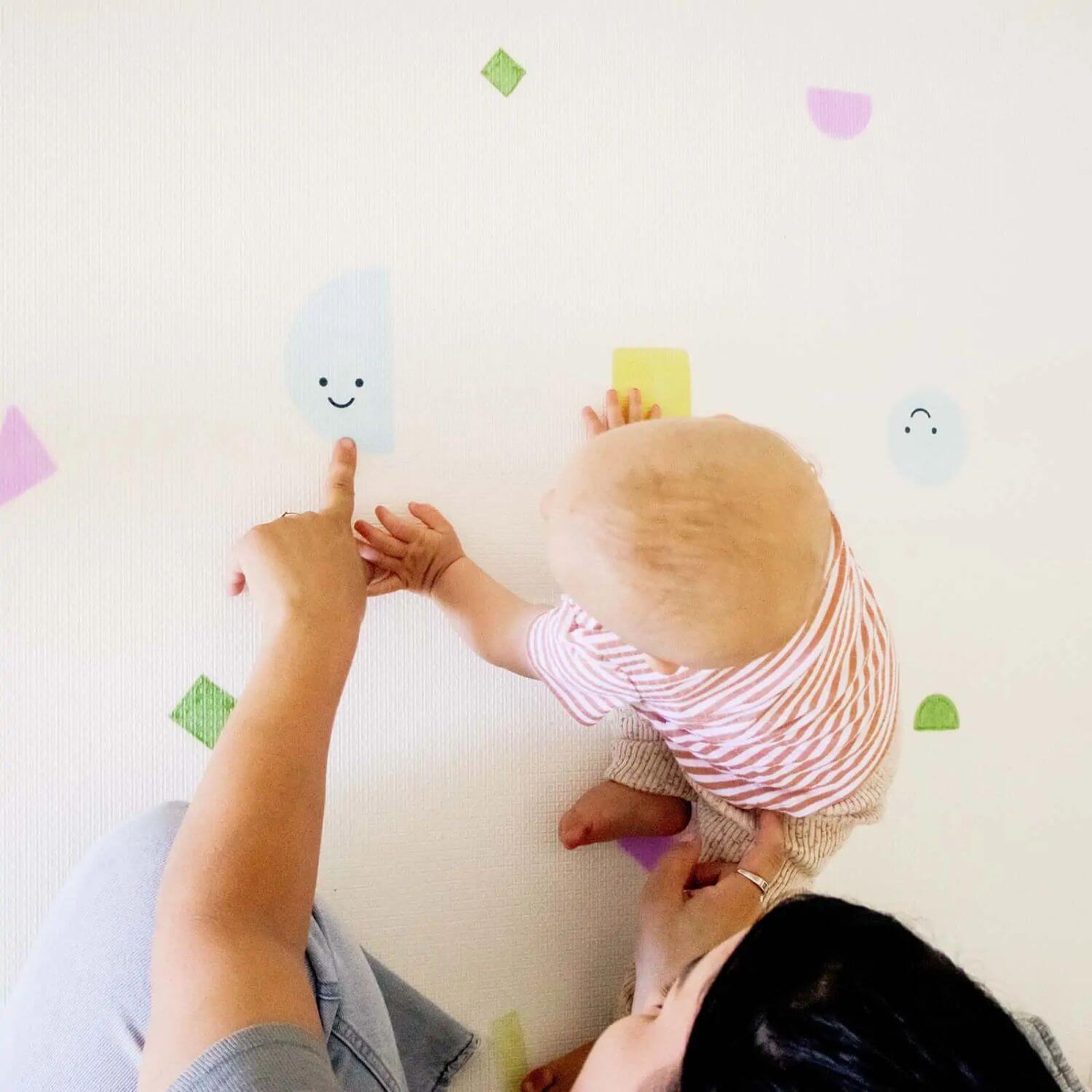 Mom & Baby Playing on Tiny Land® Double-Sided Baby Playmat Smiley Quest