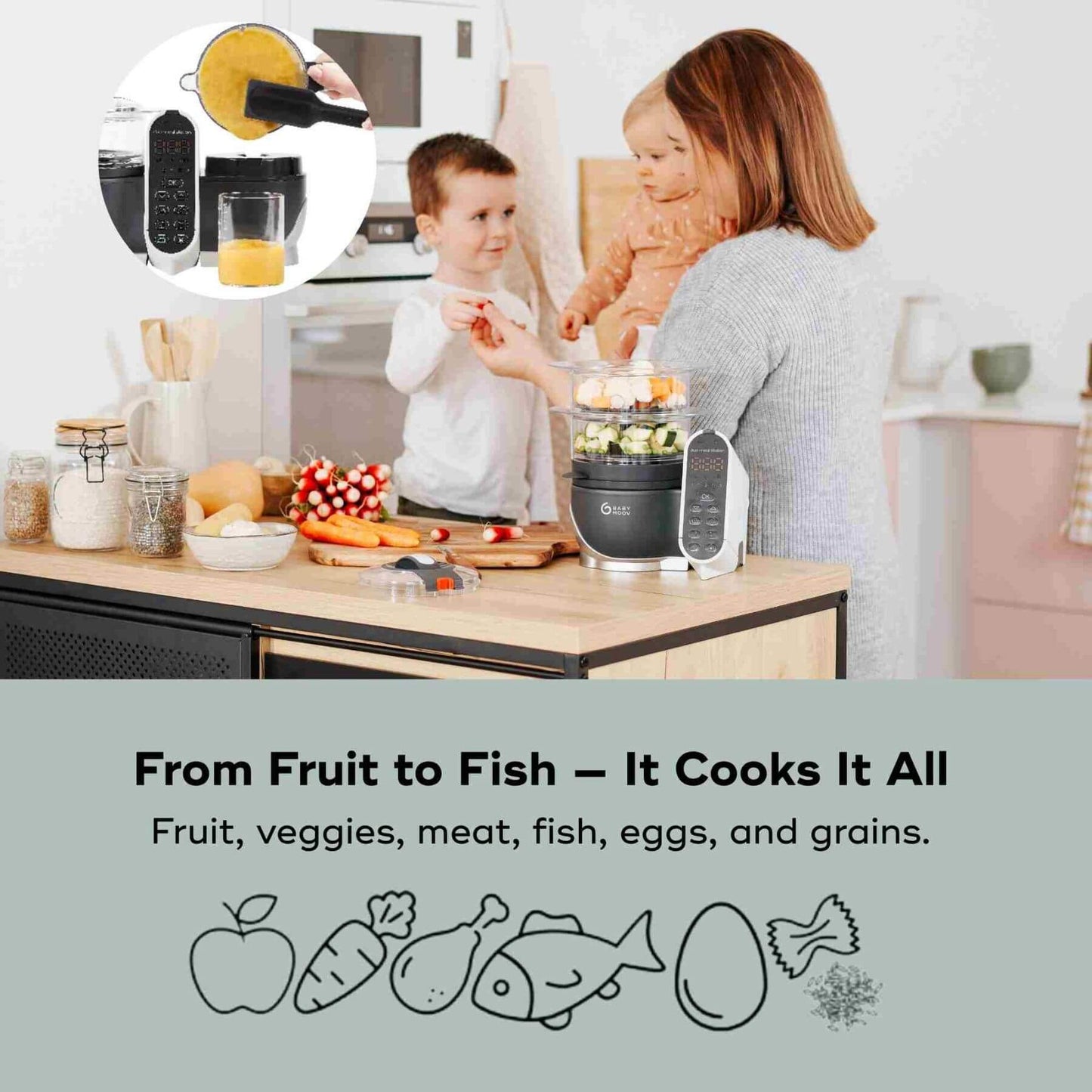 Family in a kitchen with Babymoov Duo Meal Station Baby Food Maker, surrounded by fruits and vegetables.