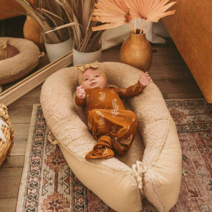Baby Sleeping in Jabaloo Duo Snuggle Nest - Ivory