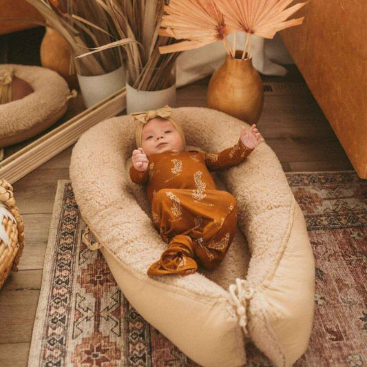 Baby Sleeping in Jabaloo Duo Snuggle Nest - Ivory