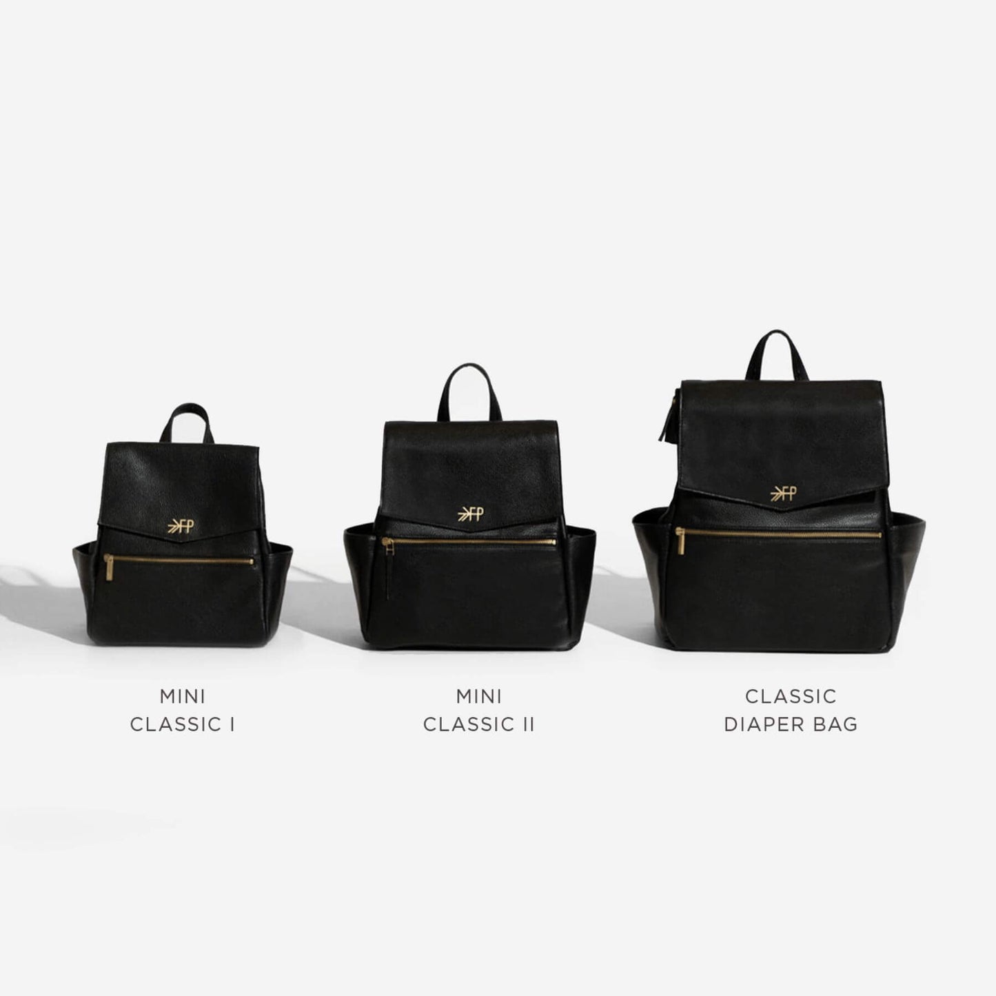 Three black diaper bags labeled 'Mini Classic I', 'Mini Classic II', and 'Classic Diaper Bag'.