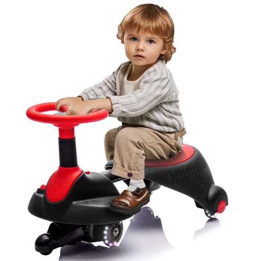 Child sitting on HIFINE 6V Kids Ride On Electric Wiggle Car - Red & Black
