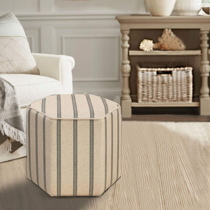 Martha Stewart Ellen Accent Ottoman in a living room setting with a sofa and decorative items.