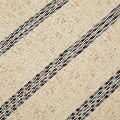 Close-up of a textured fabric with diagonal stripes on a beige background