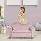 Girl Standing behind Qaba Ergonomic Foam Kids Sofa with Inner Toy Storage Chest Pink