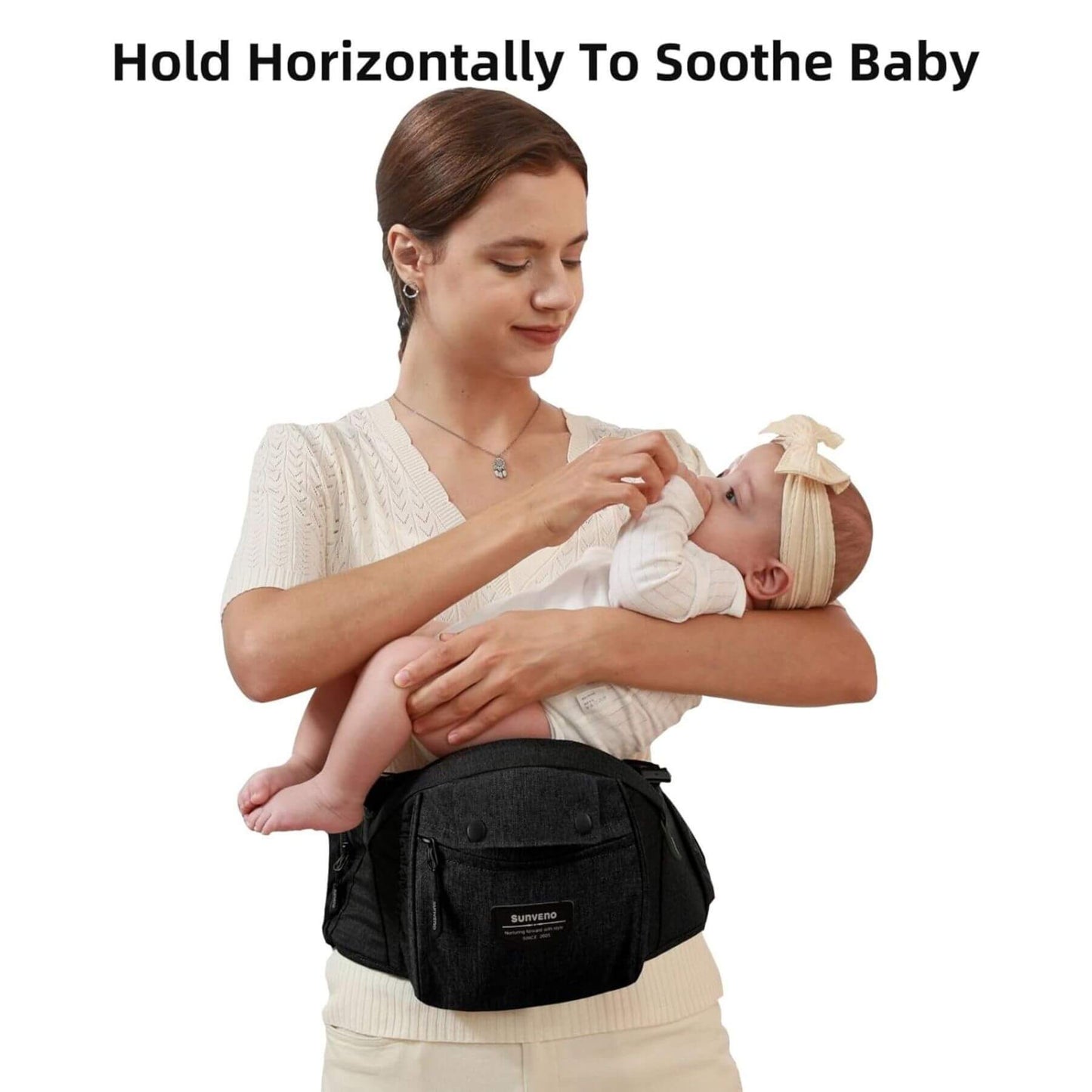 Woman carrying a baby with Sunveno Ergonomic Baby Carrier 3-in-1 Black