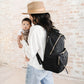 Woman Carrying JuJuBe Everyday Diaper Backpack Black