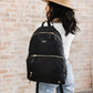 Woman Carrying JuJuBe Everyday Diaper Backpack Black