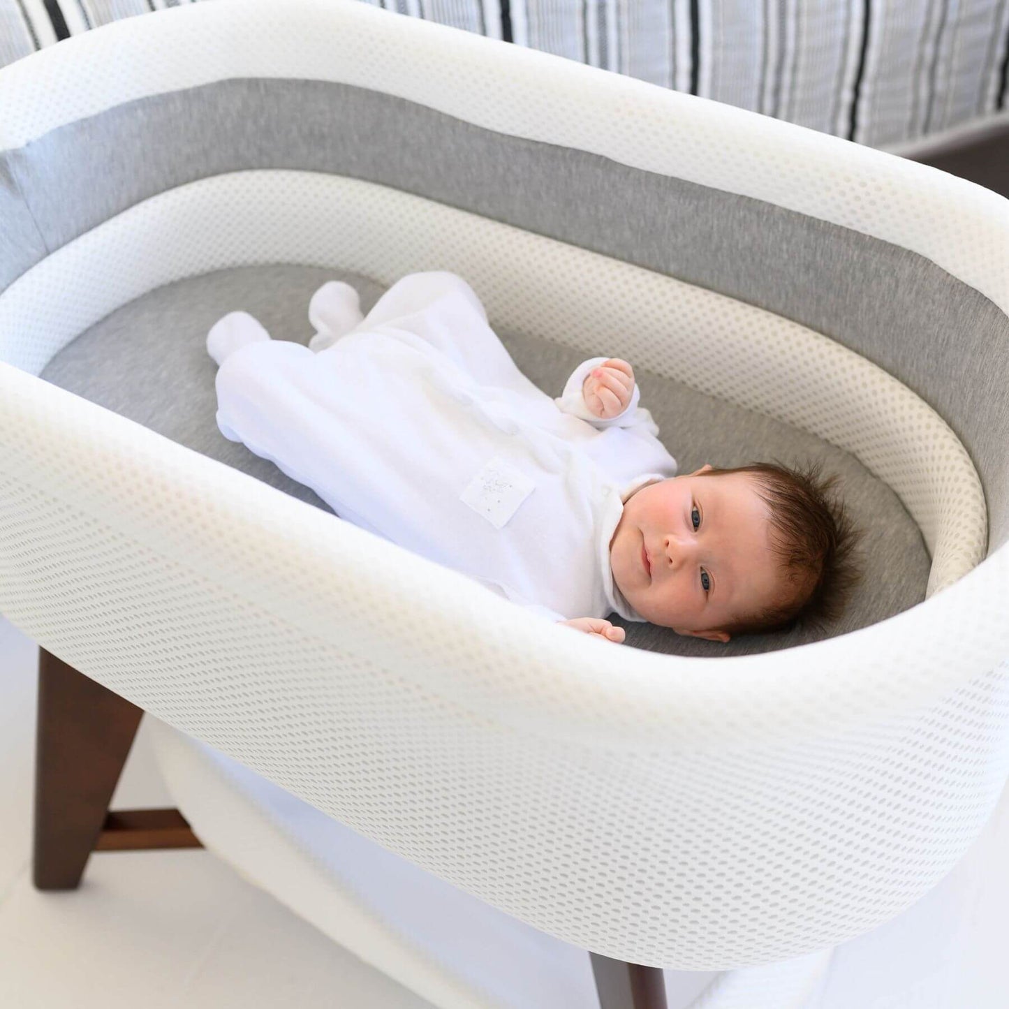 Baby Sleeping in TruBliss Evi Smart Bassinet White