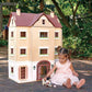 Child playing with Tender Leaf Fantail Hall outdoors