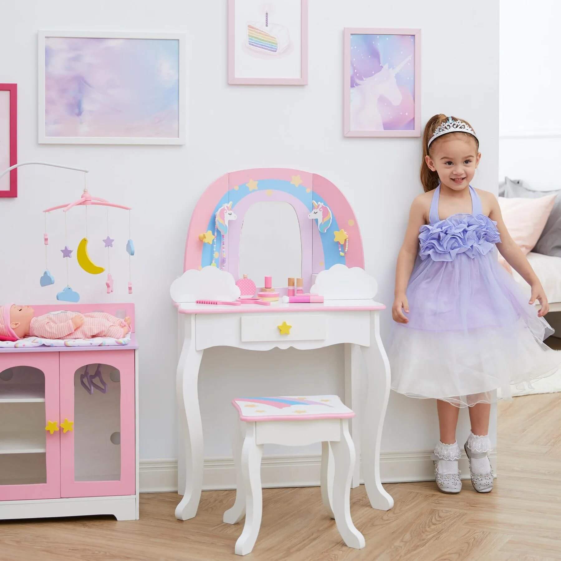 Girl Standing Next To Fantasy Fields Little Dreamer Rainbow Unicorn Vanity Table Set