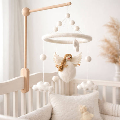 Nursery with a crib, mobile, and soft decor elements