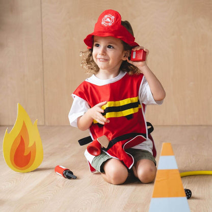 Child in PlanToys Fire Fighter Play Set
