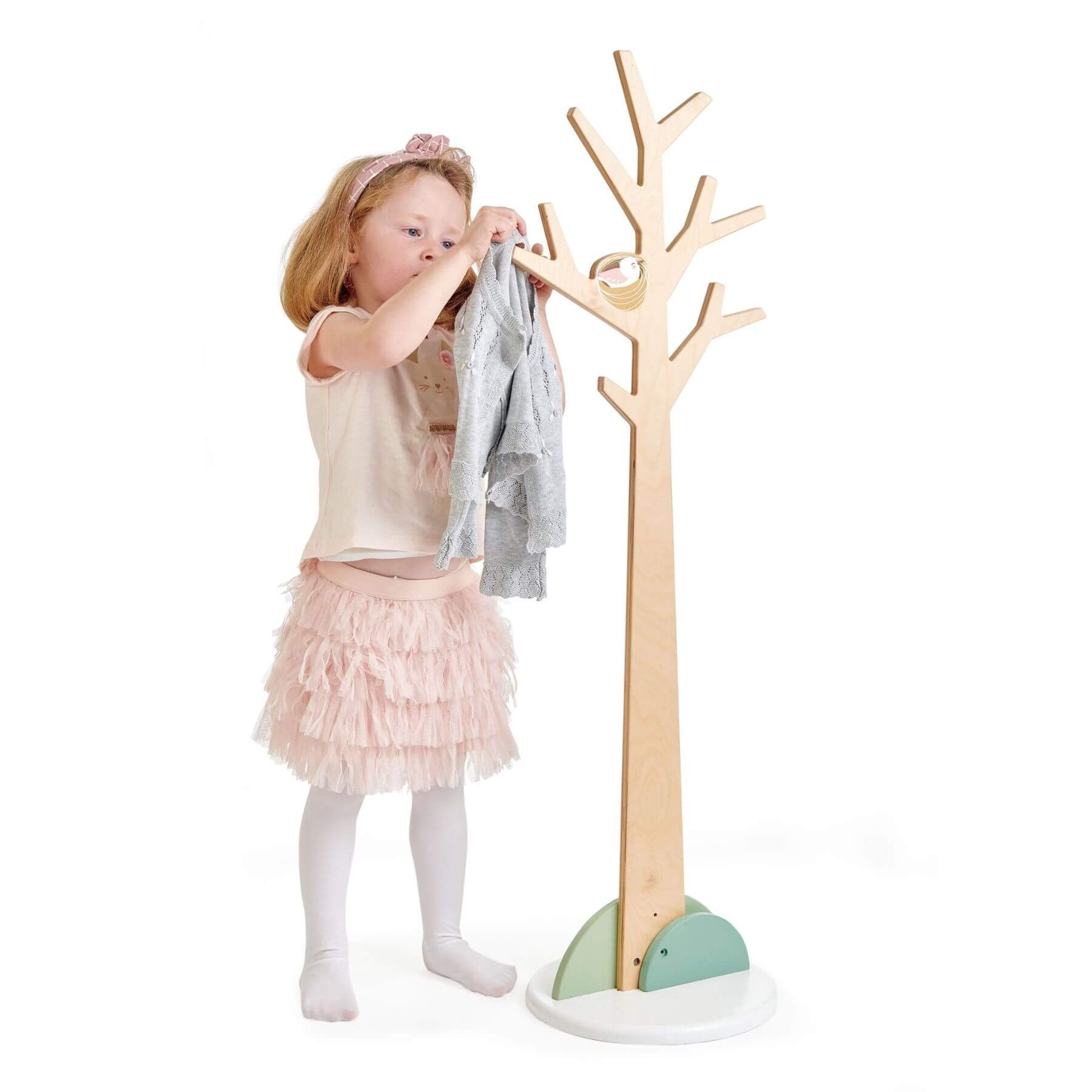 Child hanging cloth on Tender Leaf Forest Coat Stand