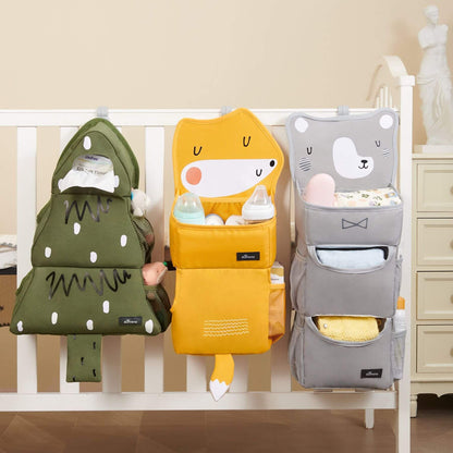 Three Forest Friends Hanging Organizers hanging on a crib.