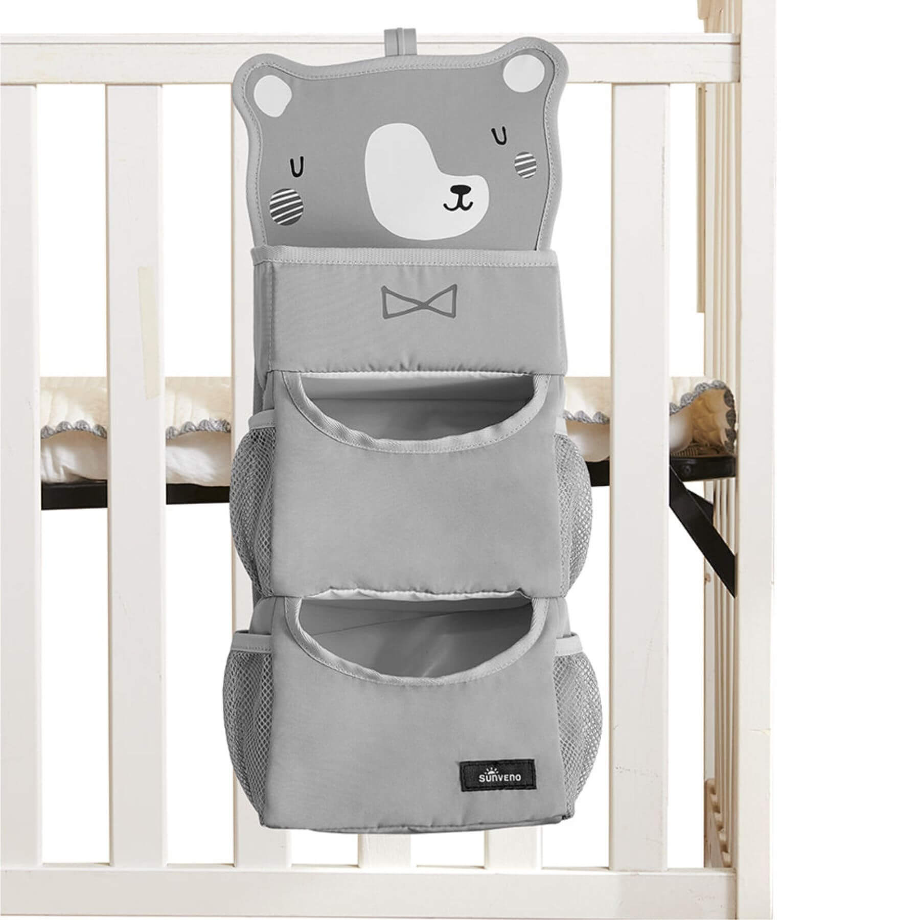 Forest Friends Hanging Organizer bear attached to a crib