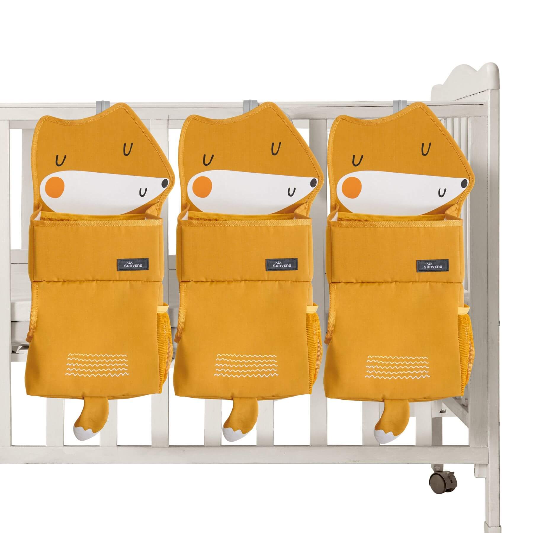 Three Forest Friends Hanging Organizer fox hanging on a crib.