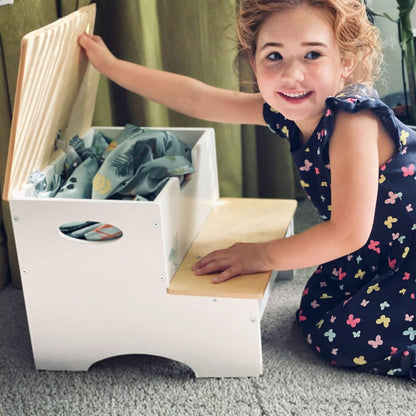 Child playing with Tender Leaf Forest Steps on a carpeted floor