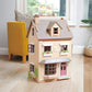 Tender Leaf Foxtail Villa on a wooden floor, yellow chair with plaid cushion in the background