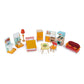 Set of colorful toy furniture pieces on a white background