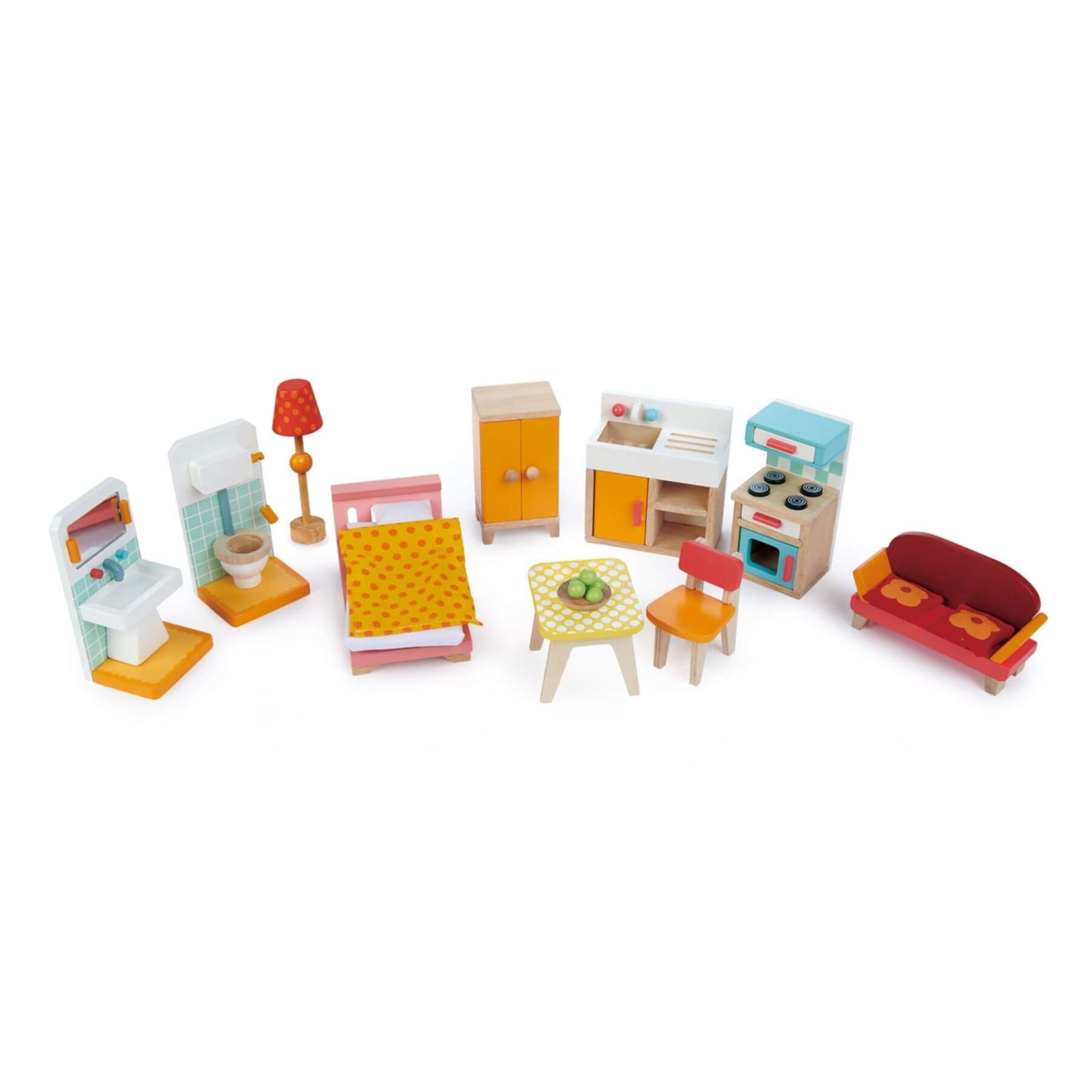Set of colorful toy furniture pieces on a white background