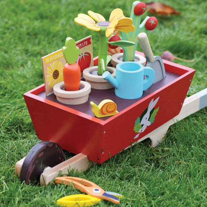 Tender Leaf Garden Wheelbarrow Set on grass