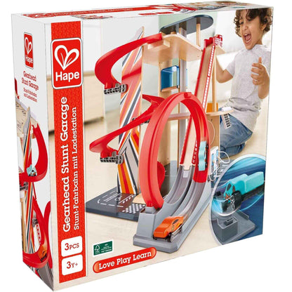 Hape toy garage set packaging with a child playing and toy cars on a white background