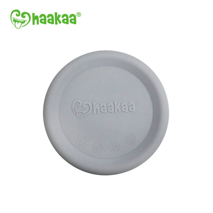 Gray silicone lid with Haakaa logo on a white background
