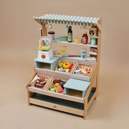 Tender Leaf General Stores, featuring various toy food items on a beige background.