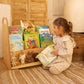 Girl Getting a book from Goodevas 2in1 Montessori Shelves Set – Bookshelf & Toy Shelf
