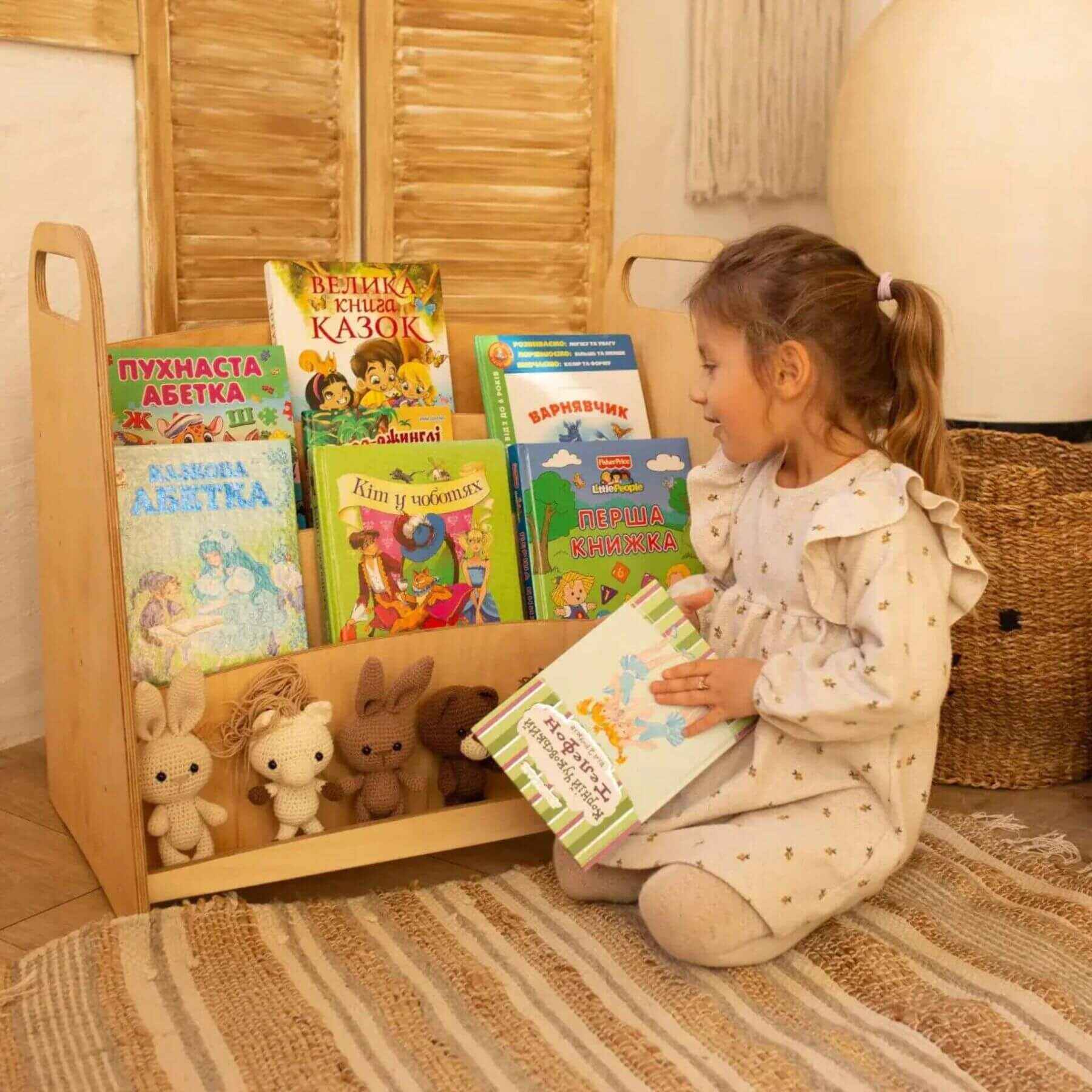 Girl Getting a book from Goodevas 2in1 Montessori Shelves Set – Bookshelf & Toy Shelf