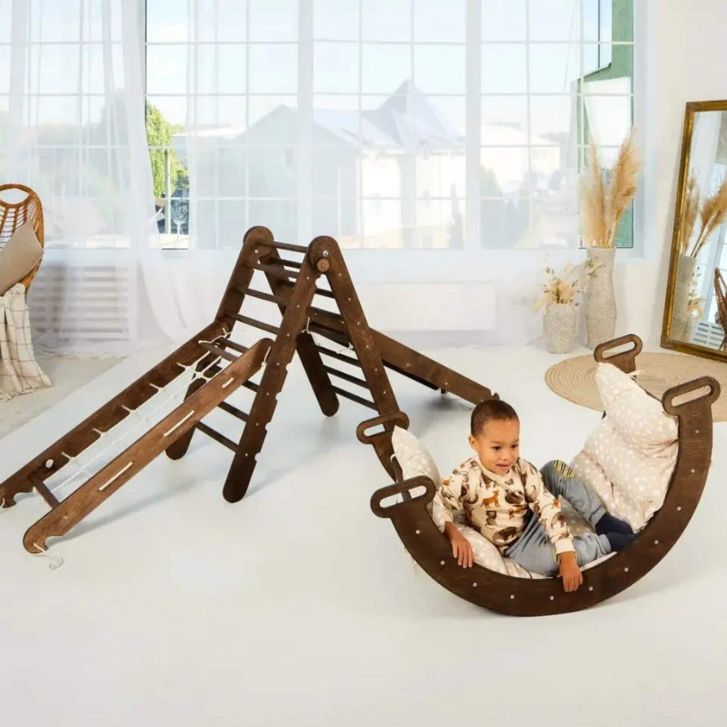 Boy playing on Goodevas 5in1 Montessori Climbing Set, in room