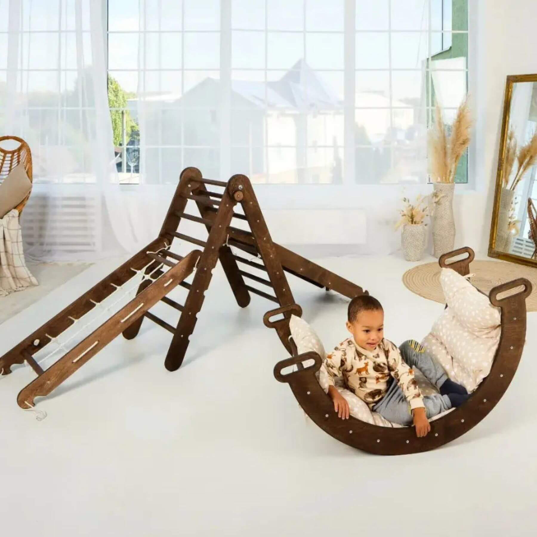 Boy playing on Goodevas 5in1 Montessori Climbing Set, in room