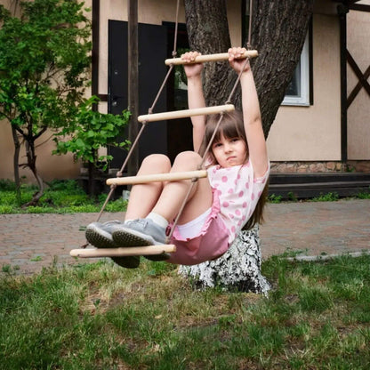 Child on Goodevas Climbing Rope Ladder in a backyard