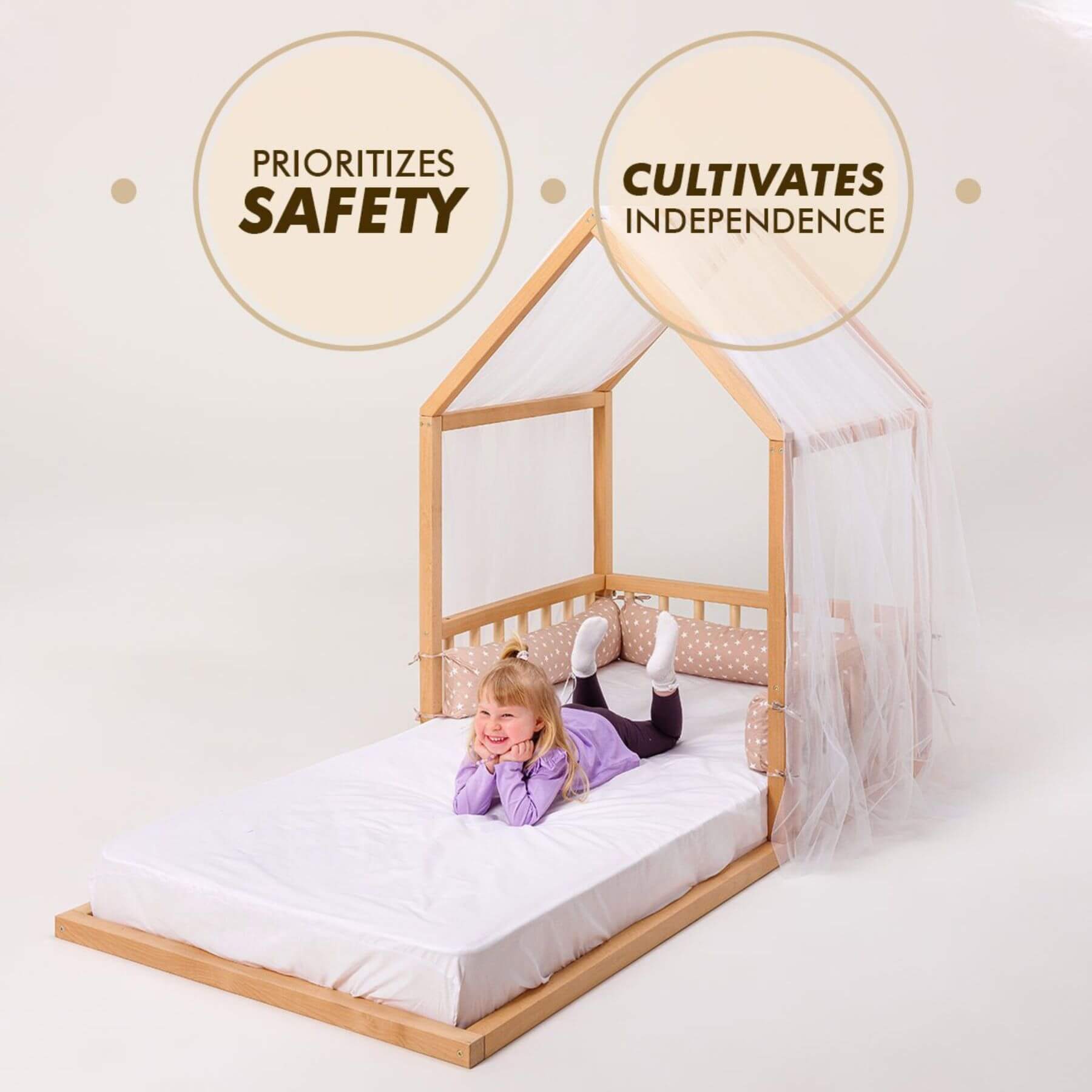 Girl lying on Goodevas Wooden Montessori House Floor Bed
