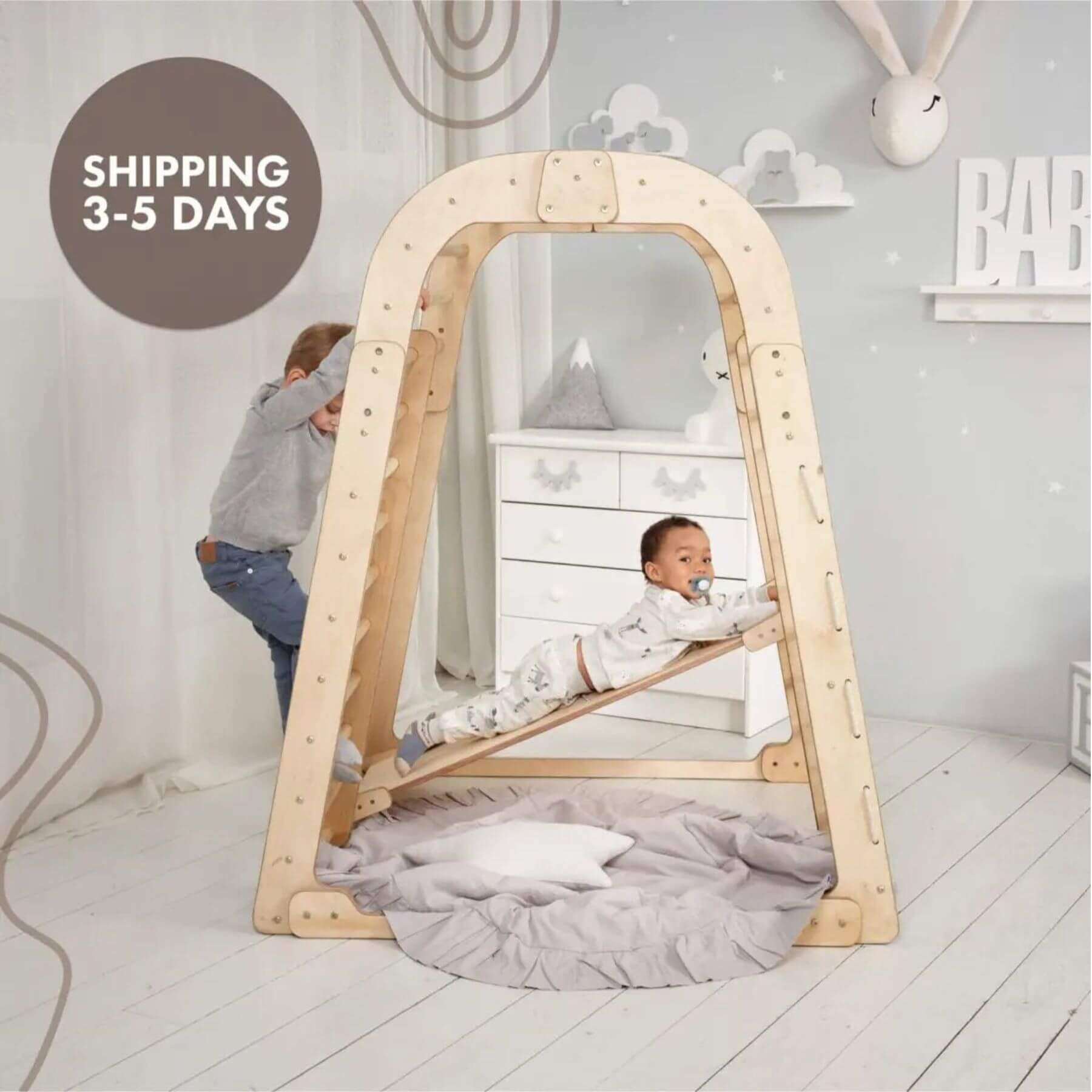 Two kid playing on Goodevas Indoor Wooden Playground, with shipping speed