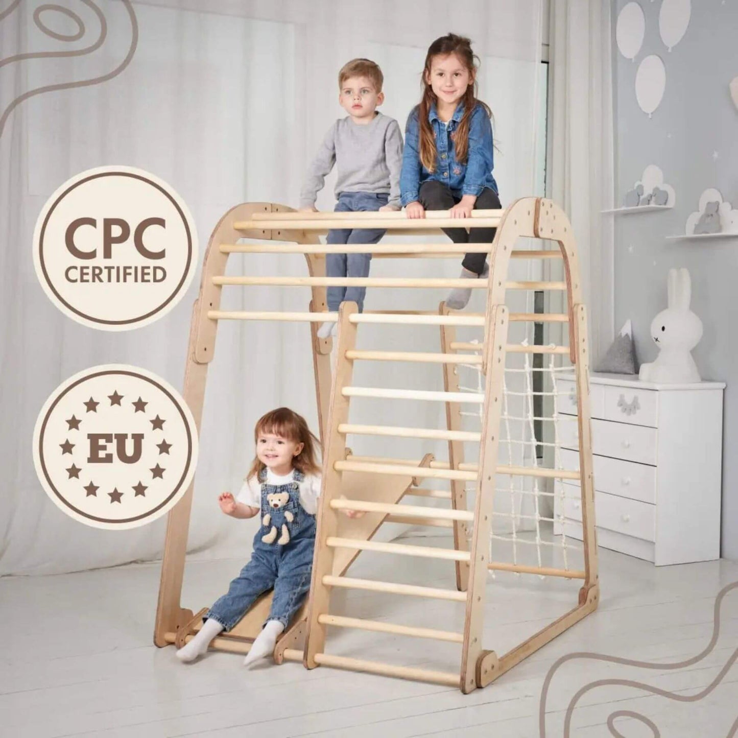 Kids playing with Goodevas Indoor Wooden Playground, with safety certifications displayed
