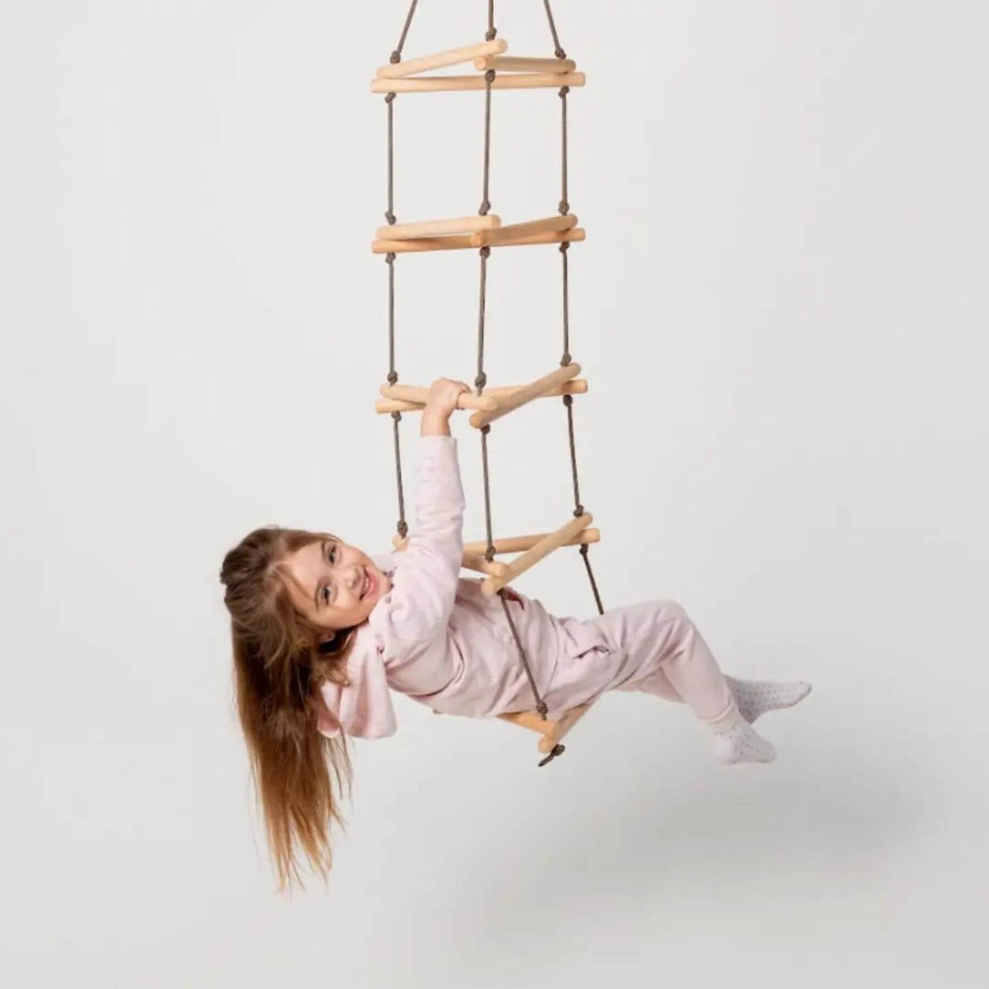 Kid playing on Goodevas Triangle Rope Ladder