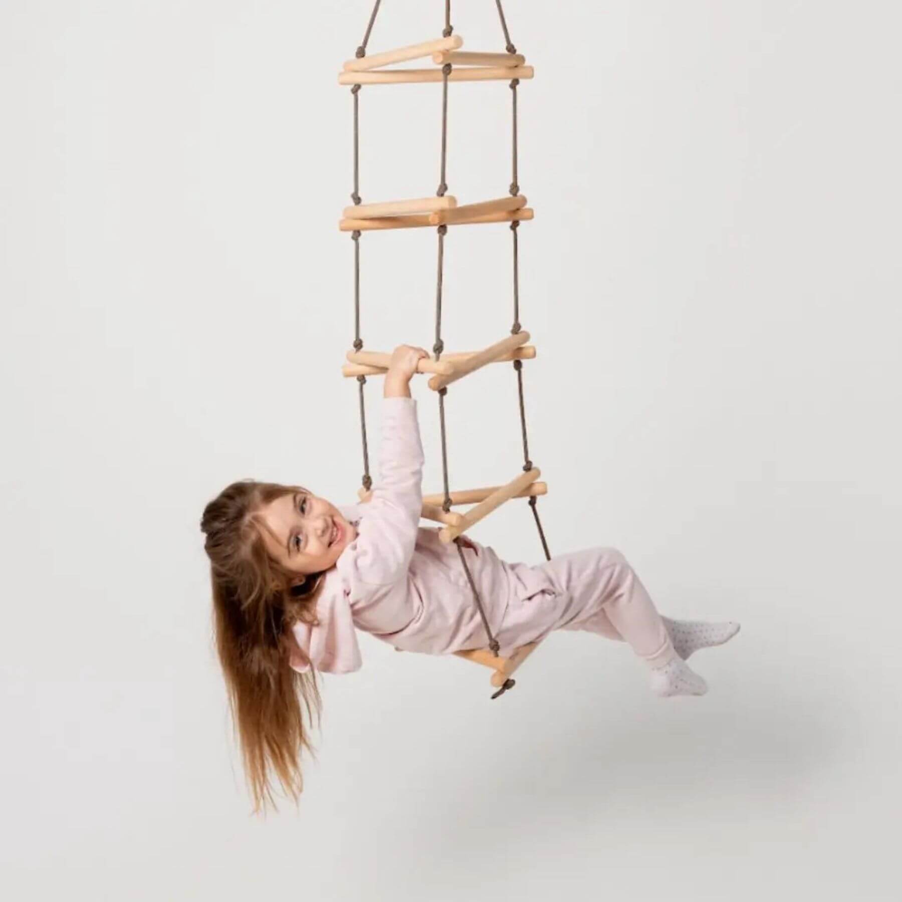 Kid playing on Goodevas Triangle Rope Ladder
